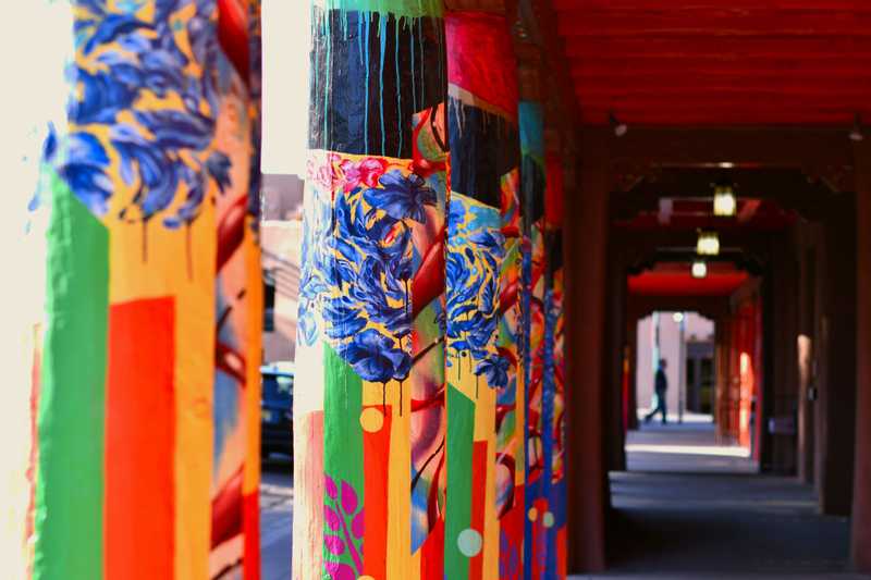 Painted pillars dripping with paint